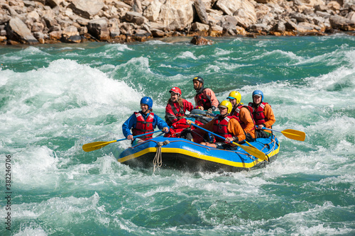 Rafting through white water rapids on the Karnali River in west Nepal