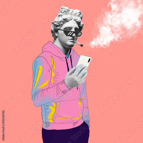 Modern art collage. Concept portrait of a man  holding mobile smartphone using app texting sms message. Gypsum head of of Apollo. Thug life.