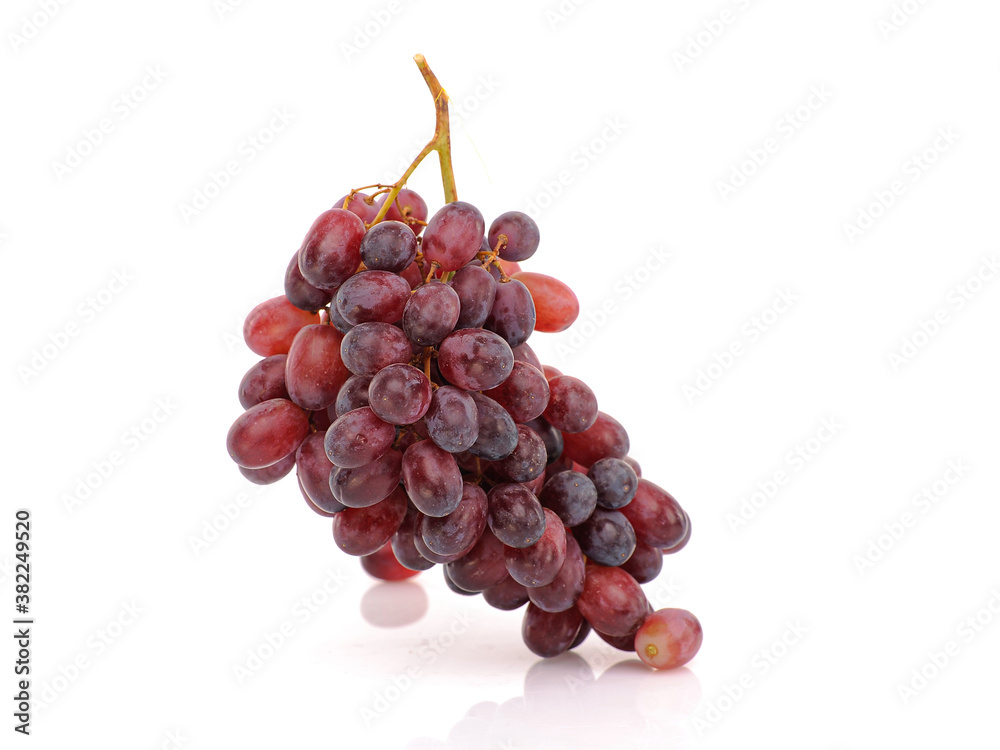 Bunch of Grapes on white reflective background. Isolated Bunch of Grapes on white reflective background. Isolated