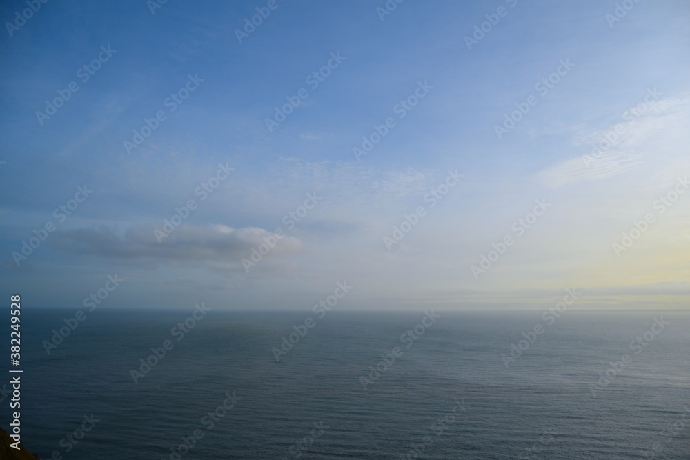 Calm sea, blue sky and horizon