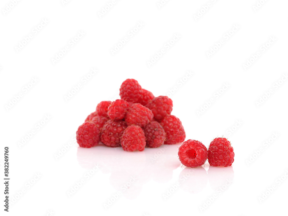 Fresh Raspberries on white reflective background. Isolated Fresh Raspberries on white reflective background. Isolated