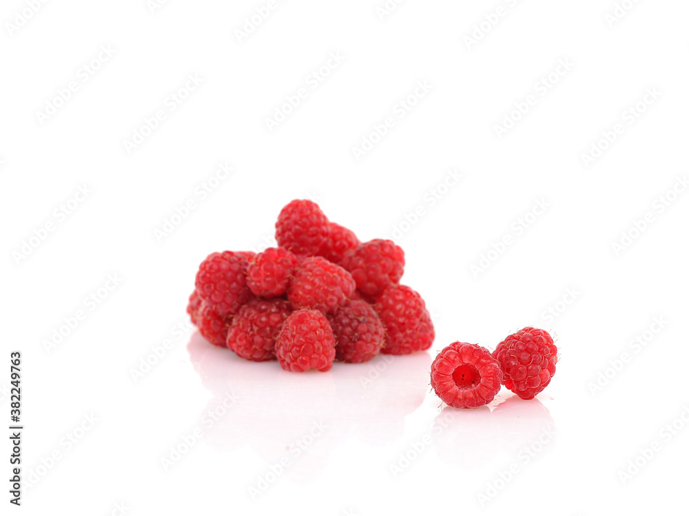 Fresh Raspberries on white reflective background. Isolated Fresh Raspberries on white reflective background. Isolated