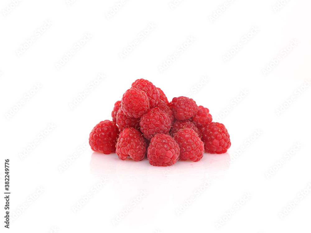 Fresh Raspberries on white reflective background. Isolated Fresh Raspberries on white reflective background. Isolated