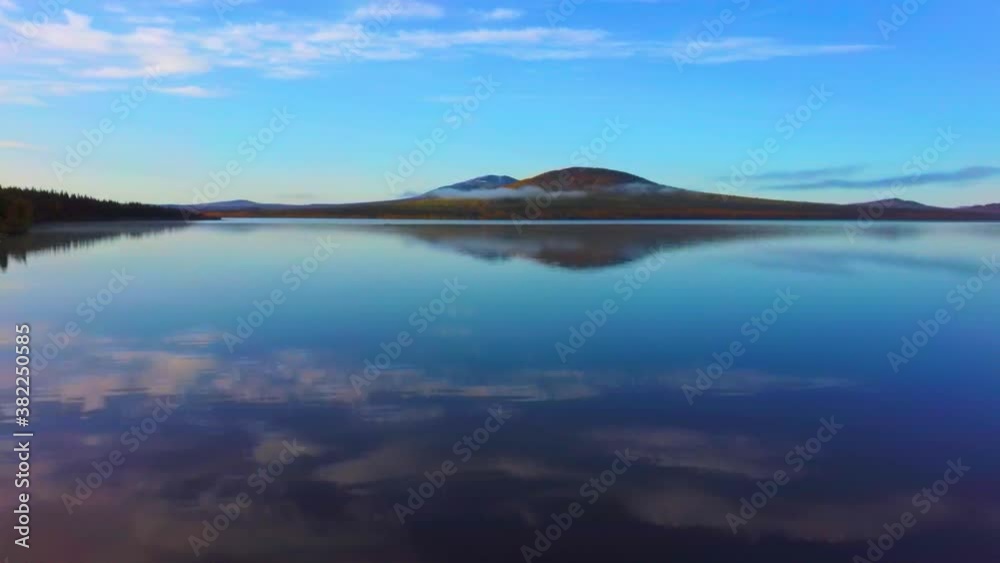 Aerial video of beautiful mountain lake on a frosty autumn morning. Aerial video of beautiful mountain lake on a frosty autumn morning.