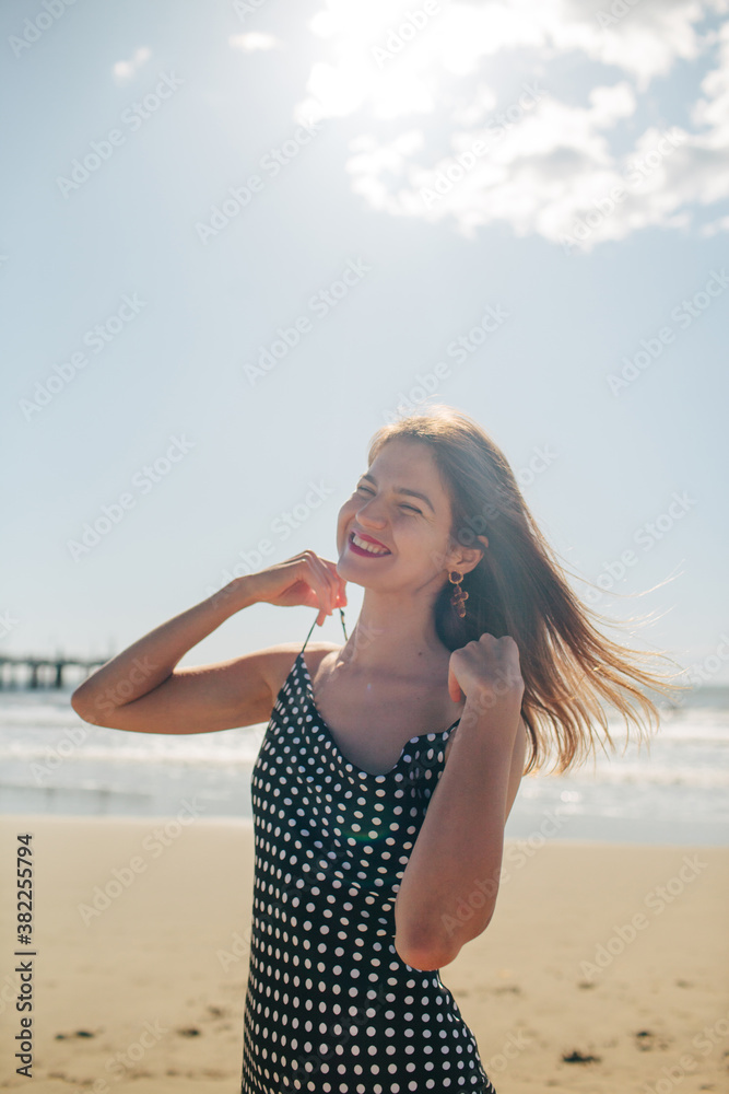 Joyful young female tourist having fun on beach Joyful young female tourist having fun on beach