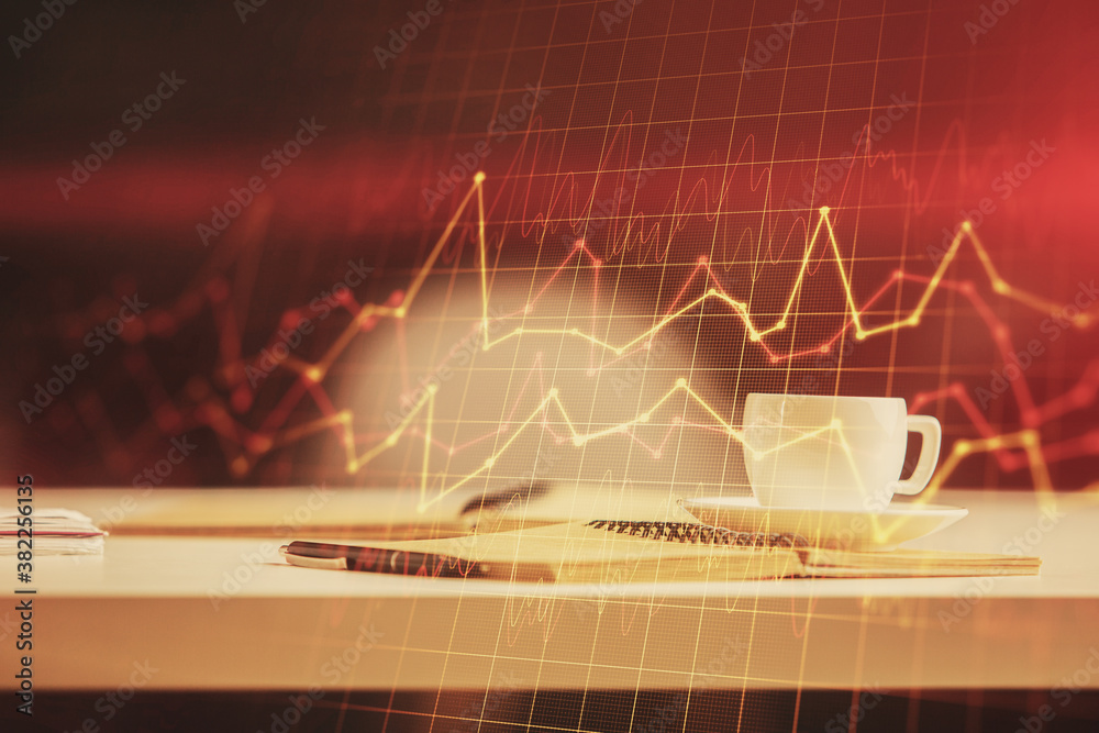 Multi exposure of forex graph drawing and desktop with coffee and items on table background. Concept of financial market trading Multi exposure of forex graph drawing and desktop with coffee and items on table background. Concept of financial market trading