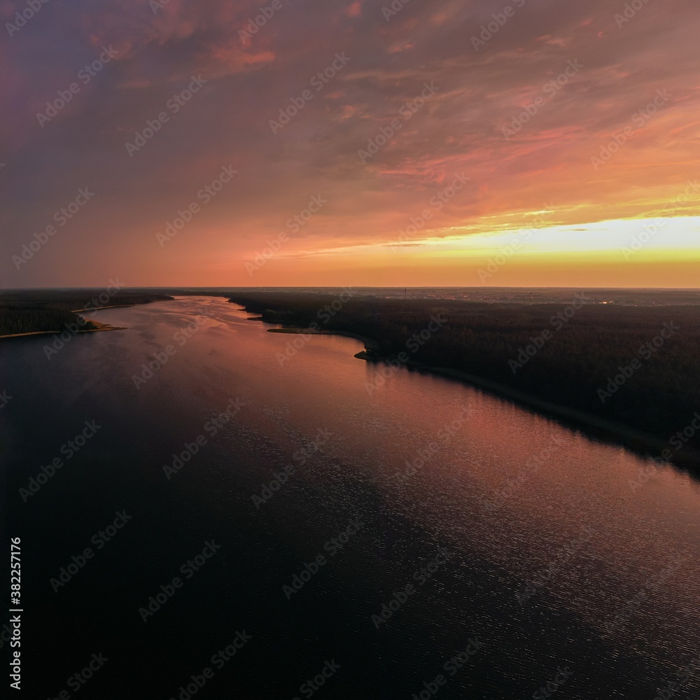 Stunning sunset over Sajno lake, Poland, aerial view