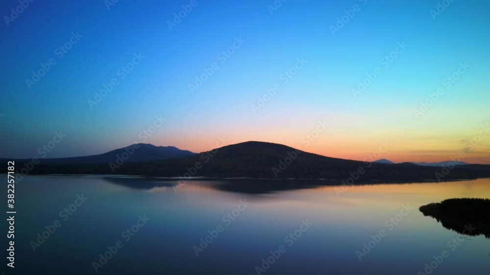 Aerial video of beautiful mountain lake on a frosty autumn morning. Aerial video of beautiful mountain lake on a frosty autumn morning.