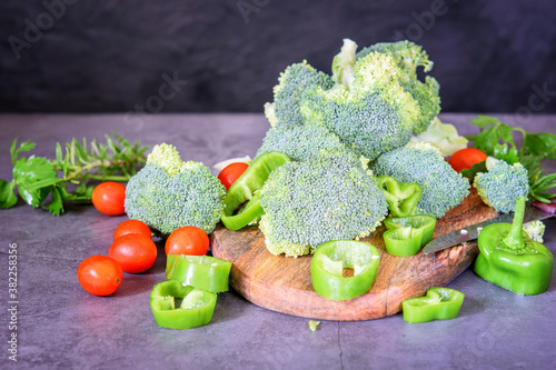 Organic fresh broccoli with pepper and tomatoes cherry  cut and prepare for cooking.