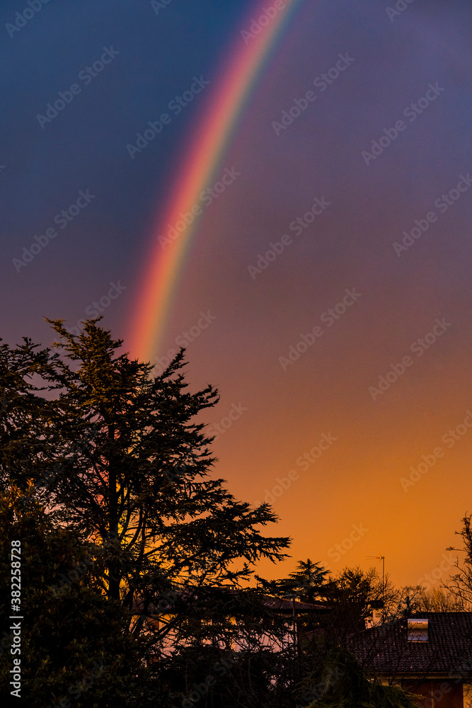 Amazing rainbow at sunset, after the thunderstorm. Amazing rainbow at sunset, after the thunderstorm.