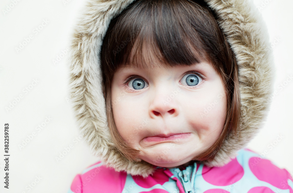 Little girl with a surprised look on her face Little girl with a surprised look on her face