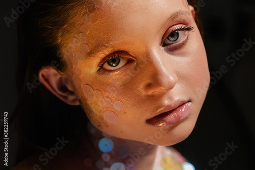 Beauty portrait of mermaid in unusual light