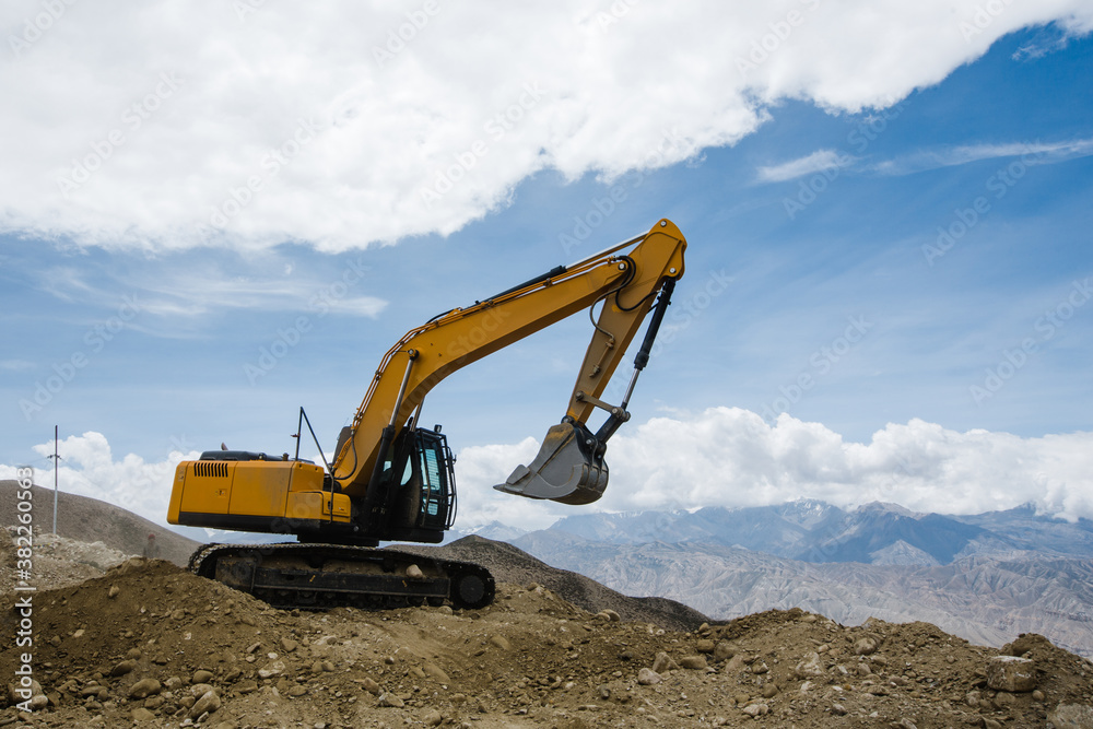 Excavator in action in rural Nepal. Excavator in action in rural Nepal.