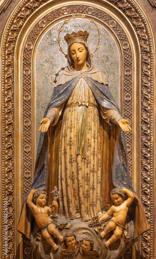 BARCELONA, SPAIN - MARCH 3, 2020: The carved polychrome statue of Immaculate Conception in the church Iglesia Santa Maria de Gracia de Jesus.