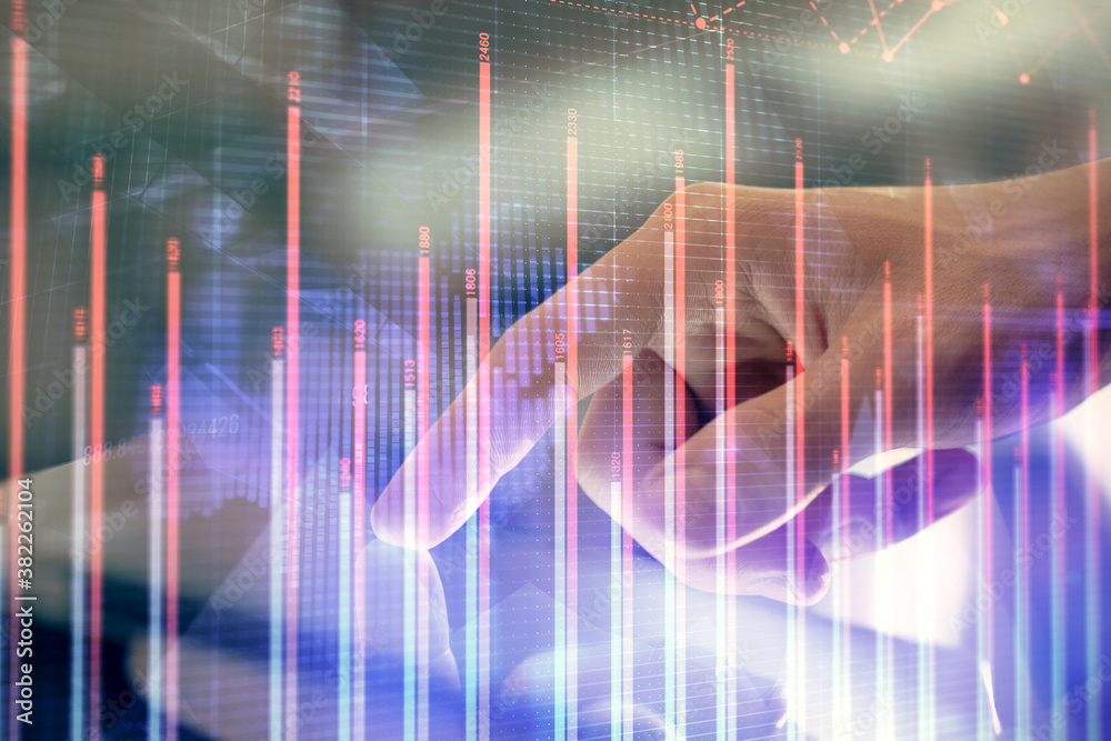 Multi exposure of man's hands holding and using a phone and financial chart drawing. Market analysis concept. Multi exposure of man's hands holding and using a phone and financial chart drawing. Market analysis concept.