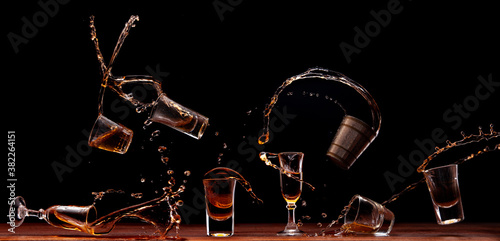 Various shots of liquor splashing photo