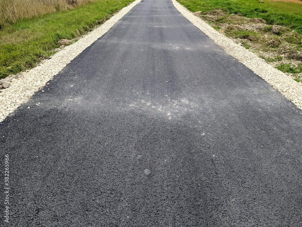 fresh asphalt in the field in the evening fresh asphalt in the field in the evening