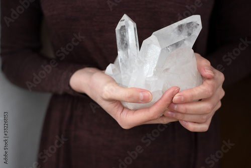 Woman holding a crystal
