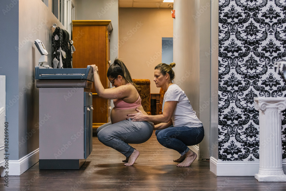 Doula Working with Expecting Mother Birthing Clinic Doula Working with Expecting Mother Birthing Clinic