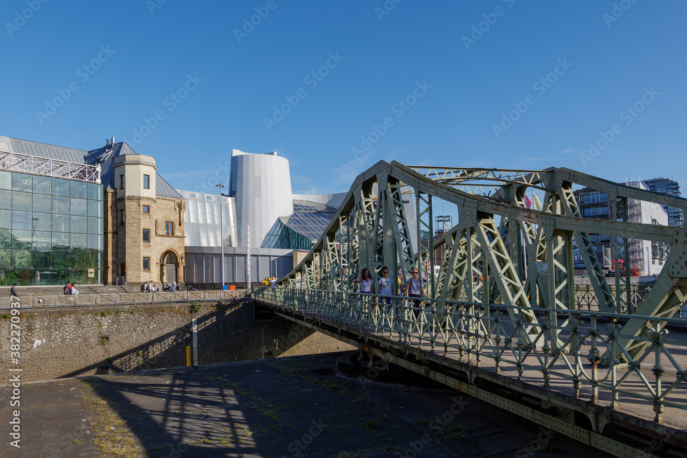 Naklejka premium Outdoor sunny view of Drehbrücke and Cologne Chocolate Museum in Düsseldorf, Germany
