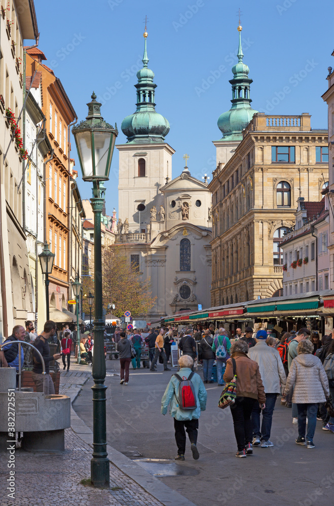 PRAGUE, CZECH REPUBLIC - OCTOBER 16, 2018: The market and the Kostel svatého Havla church.