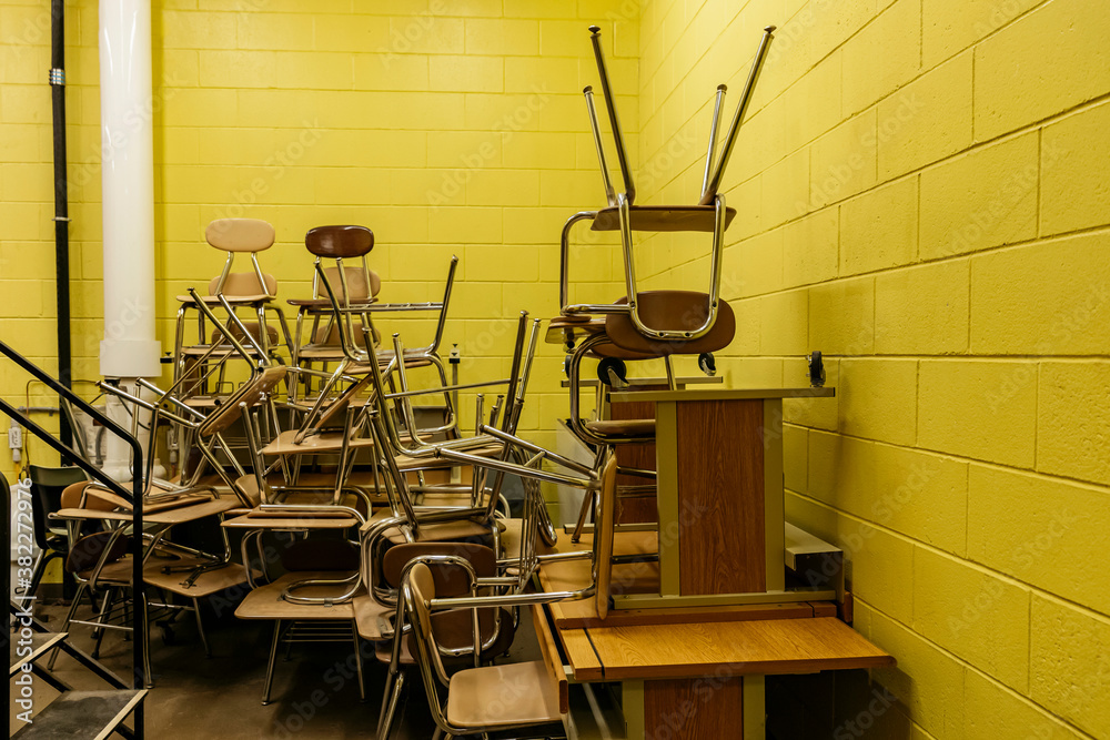 Classroom Desks Piled up in School Classroom Desks Piled up in School
