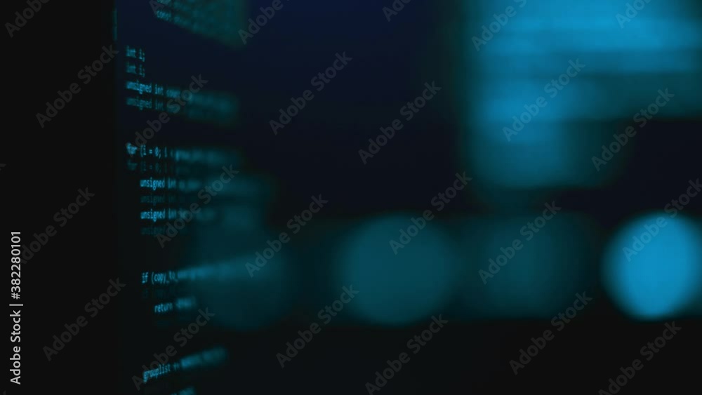 Modern tech. Program development and blockchain concept. Developer working on program codes in office. Shallow depth of field bokeh, selective focus effect. Hacking or protection data