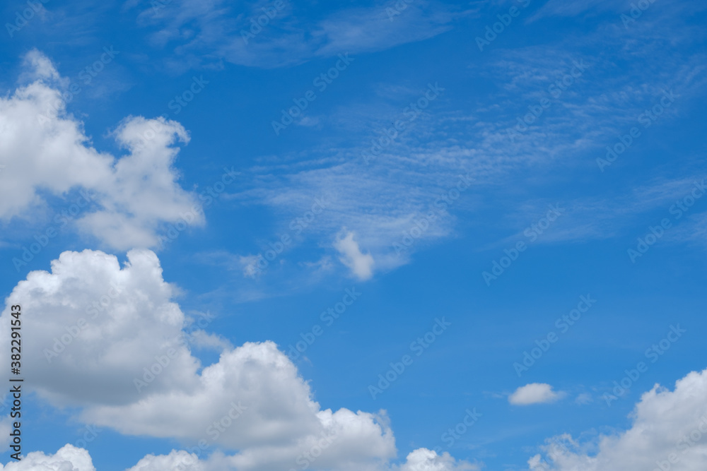 Blue sky with white clouds in daylight for background. Blue sky with white clouds in daylight for background.