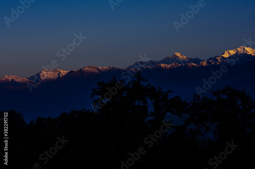 view of kedarnath peak and other peaks from chopta valley of uttarakhand in a october morning photo