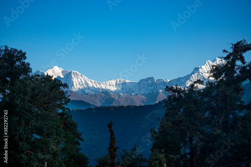 view of kedarnath peak and other peaks from chopta valley of uttarakhand in a october morning photo