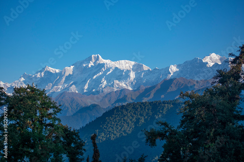 view of kedarnath peak and other peaks from chopta valley of uttarakhand in a october morning photo