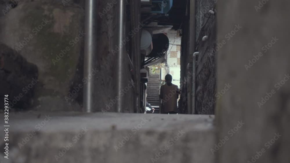 Single women walk through the narrow alleys of the ancient town