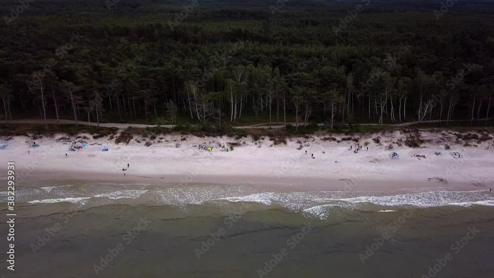 Baltic Sea Beach Aerial Shot. Beautiful Secluded Beach on Baltic Sea Coast. Cloudy Day. Lubiatowo, Pomerania, Poland. Baltic Sea Beach Aerial Shot. Beautiful Secluded Beach on Baltic Sea Coast. Cloudy Day. Lubiatowo, Pomerania, Poland.