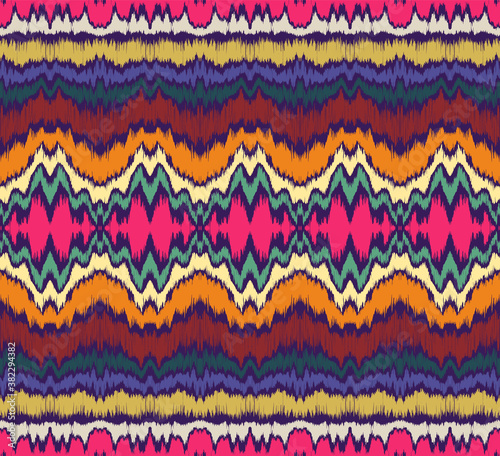 Ikat border. Geometric folk ornament. Ink on clothes. Tribal vector texture. Seamless striped pattern in Aztec style. Ethnic embroidery. Indian, Scandinavian, Gypsy, Mexican, African rug.