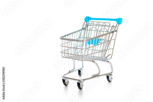 Products cart. Food shopping basket for retail market. Empty trolley cart for supermarket isolated on white background. Creative idea for shopping online, summer sale, supermarket.
