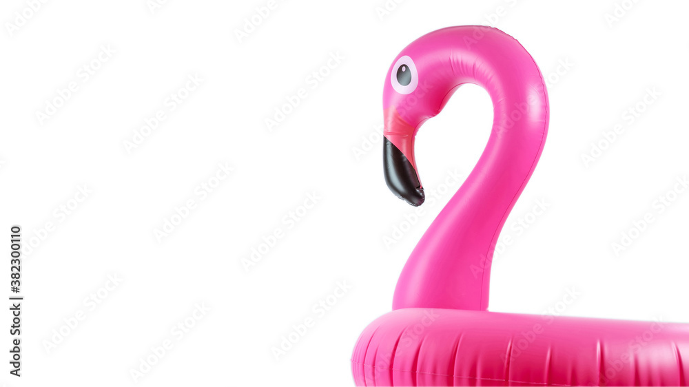 Fototapeta Beach flamingo. Pink pool inflatable flamingo for summer beach isolated on white background. Trendy summer concept.