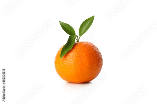 Ripe mandarin with leaves isolated on white background