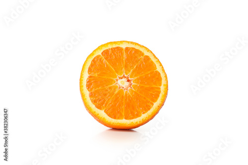 Half of ripe mandarin isolated on white background