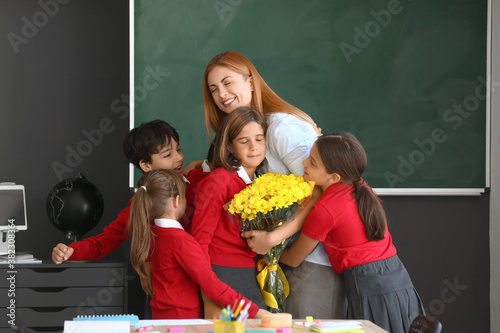 Schoolchildren greeting the...