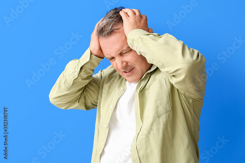 Stressed mature man on colo...