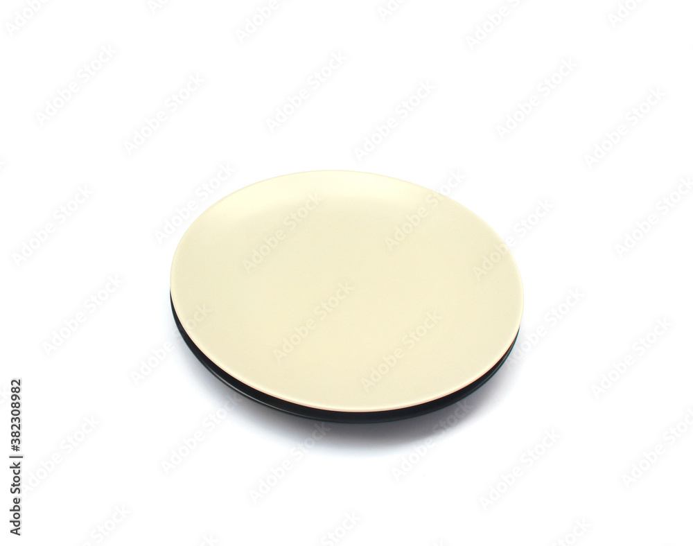 Empty ceramics white plate isolated on white background with clipping path Empty ceramics white plate isolated on white background with clipping path