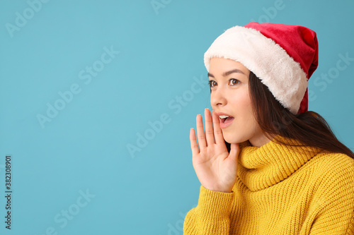 Gossiping young woman in Sa...