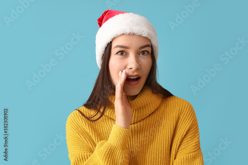 Gossiping young woman in Sa...