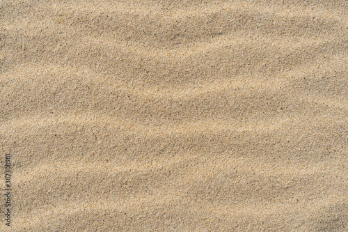 Sand texture. Top view. Sandy beach for background.