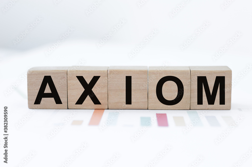 AXIOM word made with building blocks on a light background AXIOM word made with building blocks on a light background