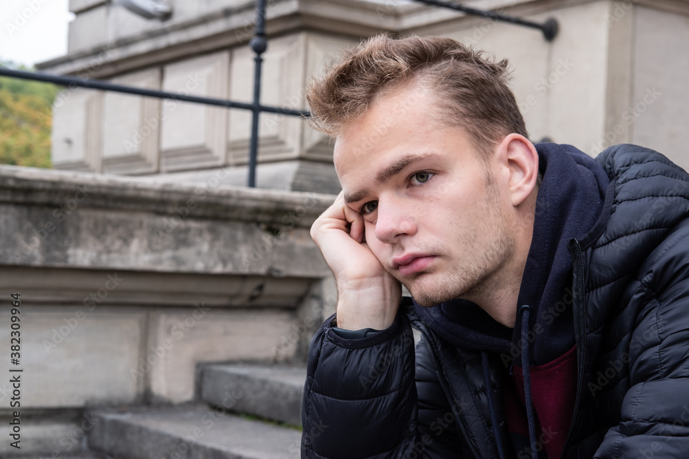 Street portrait of a serious guy