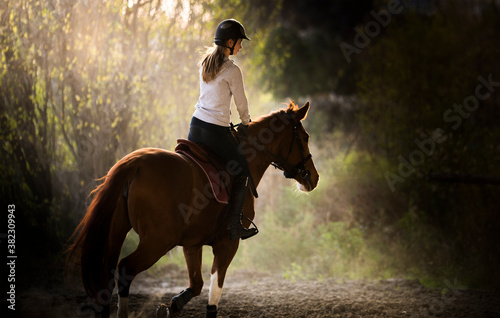 Young  girl riding a horse © Dusan Kostic
