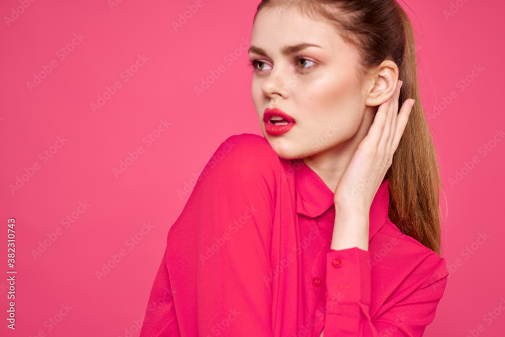 attractive girl in pink shirt cropped view bright makeup red lips gesturing with hands Copy Space attractive girl in pink shirt cropped view bright makeup red lips gesturing with hands Copy Space