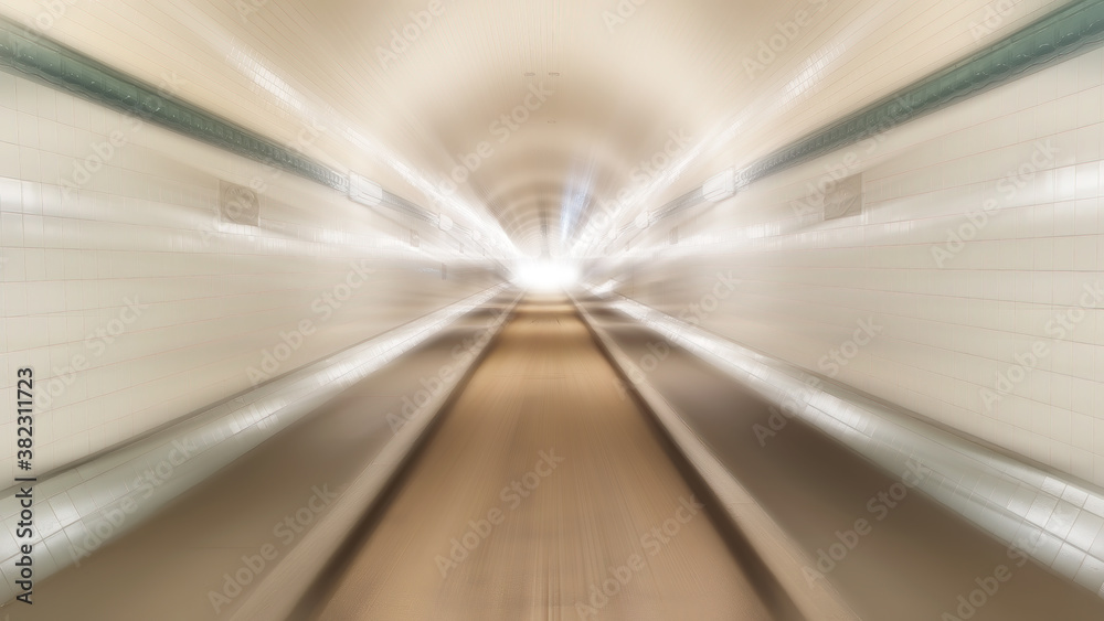 Radial motion Blur in a underground passageway tunnel with white radial light effect. Radial motion Blur in a underground passageway tunnel with white radial light effect.