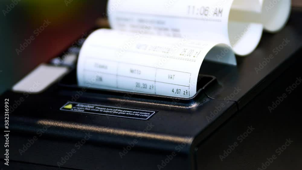 The cashier issued a sales receipt after purchasing the goods. High quality 4k footage